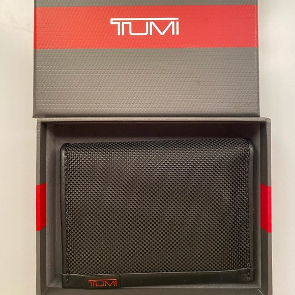 tumi l fold wallet